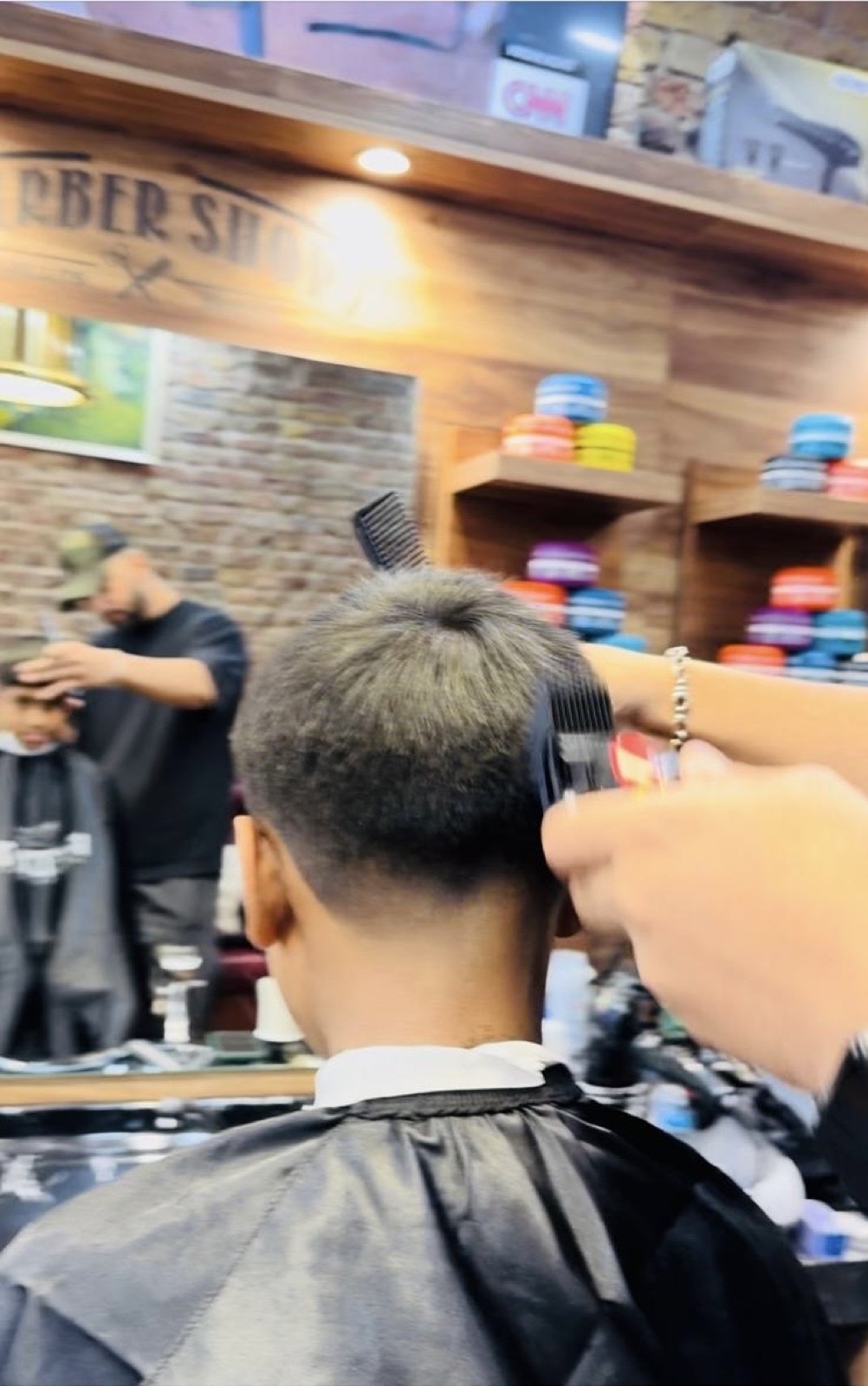 Clippers, scissors and comb on the counter